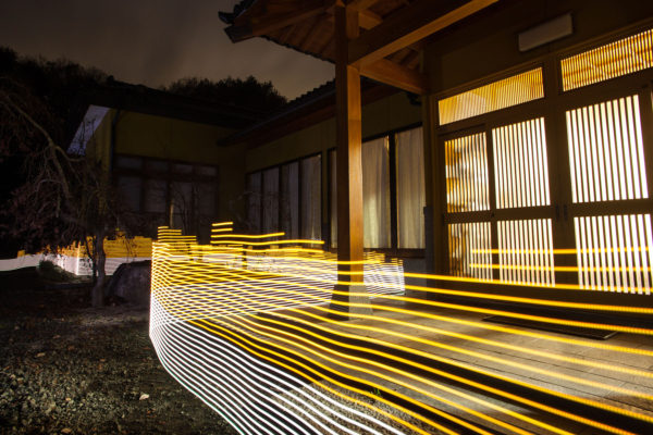 A special light painting technique reveals radioactive contamination surrounding the Sato family house in Iitate. The property has been decontaminated, but contamination from the surrounding forests continually re-contaminates the house. Here we see radiation levels between 0.2uSv/h and 0.5uSv/h, with yellow showing spots elevated above the government decontamination target of 0.23 uSv/h. Greenpeace/Greg McNevin