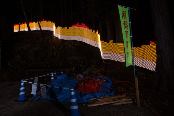 A special light painting technique reveals radioactive contamination at Toru Anzai's former home in Iitate. Surrounded by forest, the property remains contaminated despite being cleaned up. Five years on Mr Anzai is tryign to move on with his life, and as he does not wish to return to his contaminated home, it is now falling into disrepair. Here we see radiation levels between 0.61uSv/h and 1.11uSv/h, with yellow showing spots elevated above the government decontamination target of 0.23 uSv/h, and red above 1uSv/h. Greenpeace/Greg McNevin