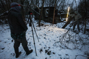 Greg McNevin uses a Pixelstick to create banners in contaminated parts of the Bryansk region, Russia. Greenpeace/Evgeny Usov