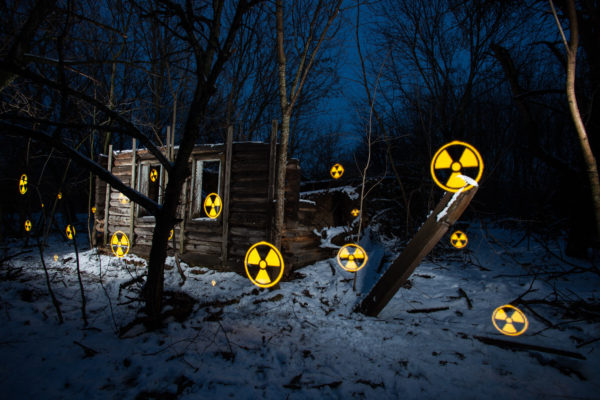 A Pixel Stick is used to paint nuclear symbols and messages in front of a decaying house in the village of Svyatsk (Святск), Russia. Like the rest of the village, the contaminated house was abandoned in the wake of the 1986 Chernobyl nuclear disaster areas. Greenpeace/Greg McNevin